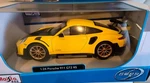 New In Box! Maisto Porsche 911 GT2 Yellow With Gold Wheels 1:24 Diecast Car. Price: $19.95.