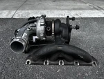 09-14 Volkswagen Tiguan 2.0L At Fwd Exhaust Manifold Turbo Supercharger Used. Price: $225.00.